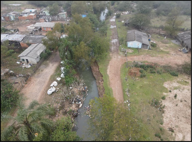 Montanha com cidade ao fundo

Descrição gerada automaticamente